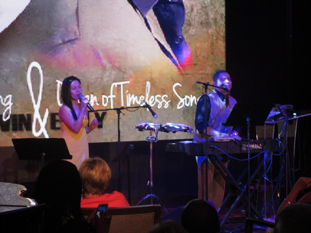 Two singers entertaining on a cruise ship. 