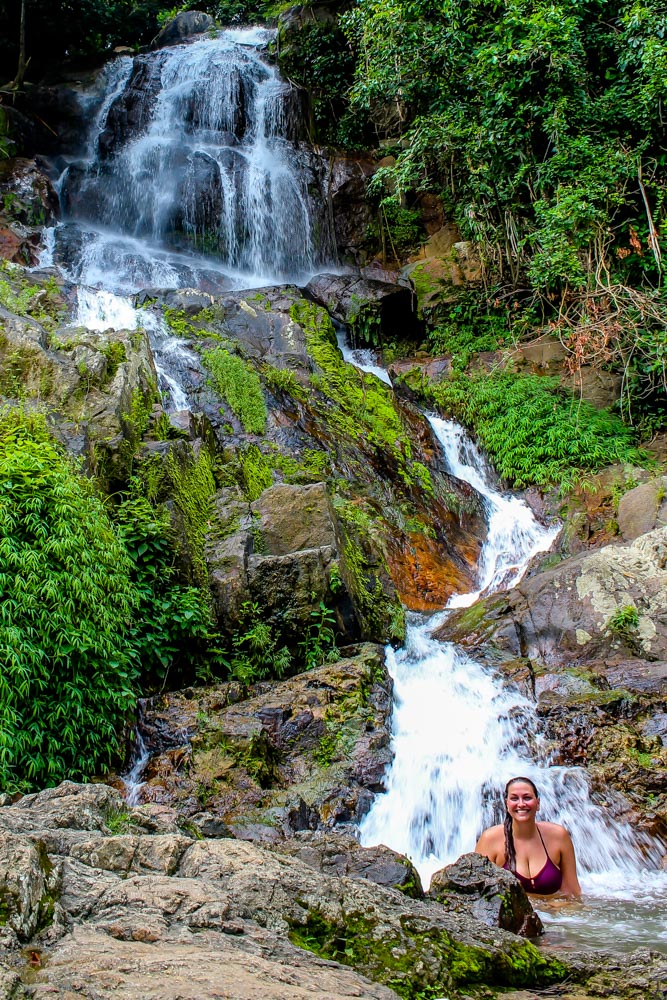 Girl by a waterfall