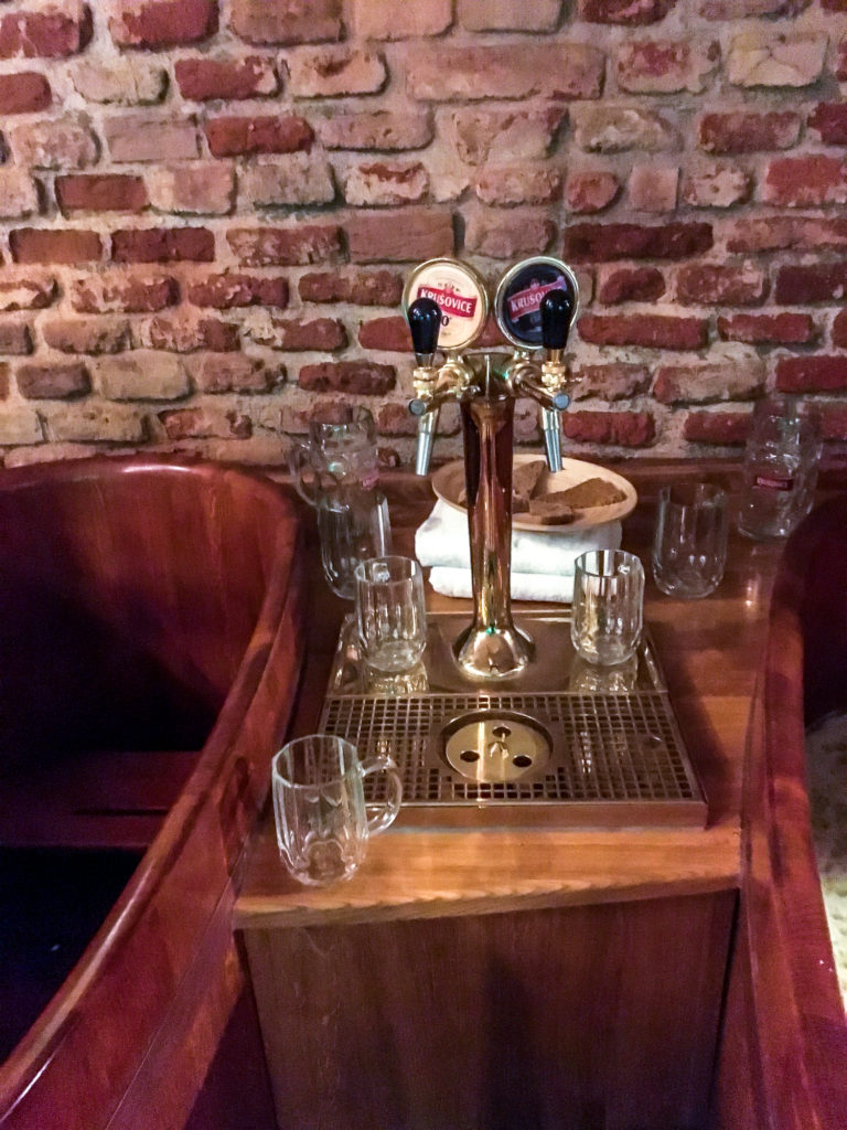 Beer taps next to the beer bath