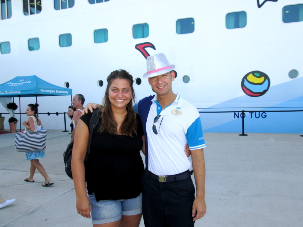 Girl with a member of the staff on a Norwegian cruise ship