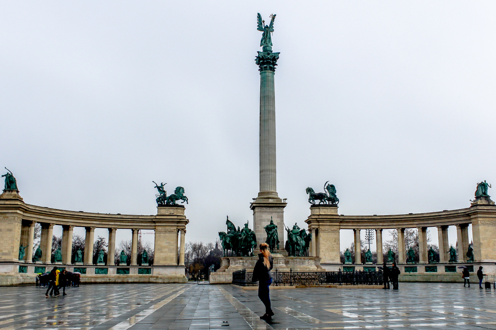Girl standing in Heroes square in Budapest