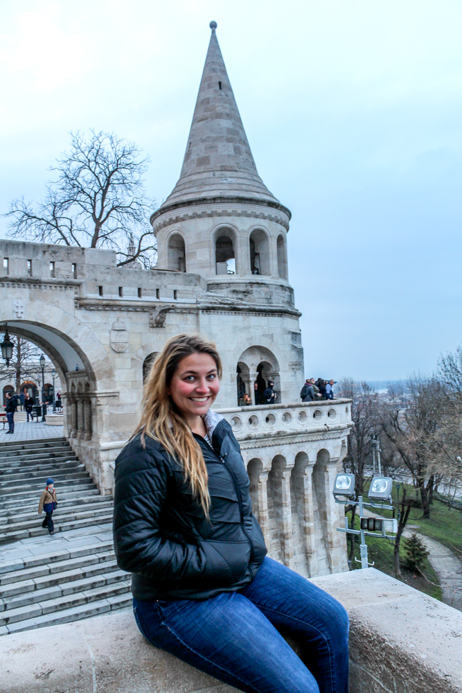 Girl sitting in fornt of Fisherman's Bastien in Budapest