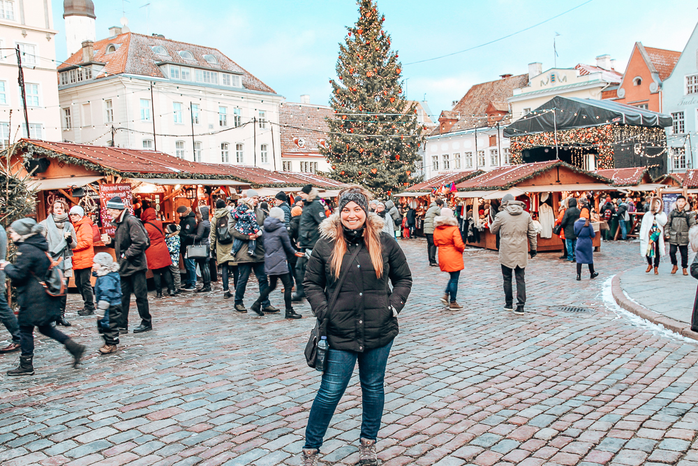 Girl in front of Tallinn Christmas market